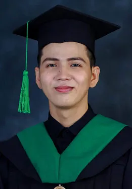 Man wearing graduating gown