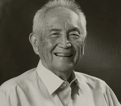Older Asian man smiling