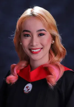 Girl wearing graduating gown