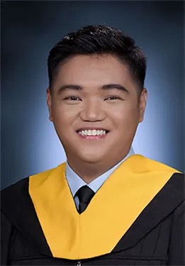 Man wearing graduating gown