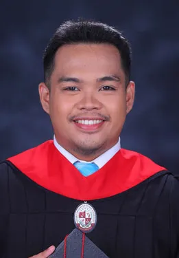 Man wearing graduating gown